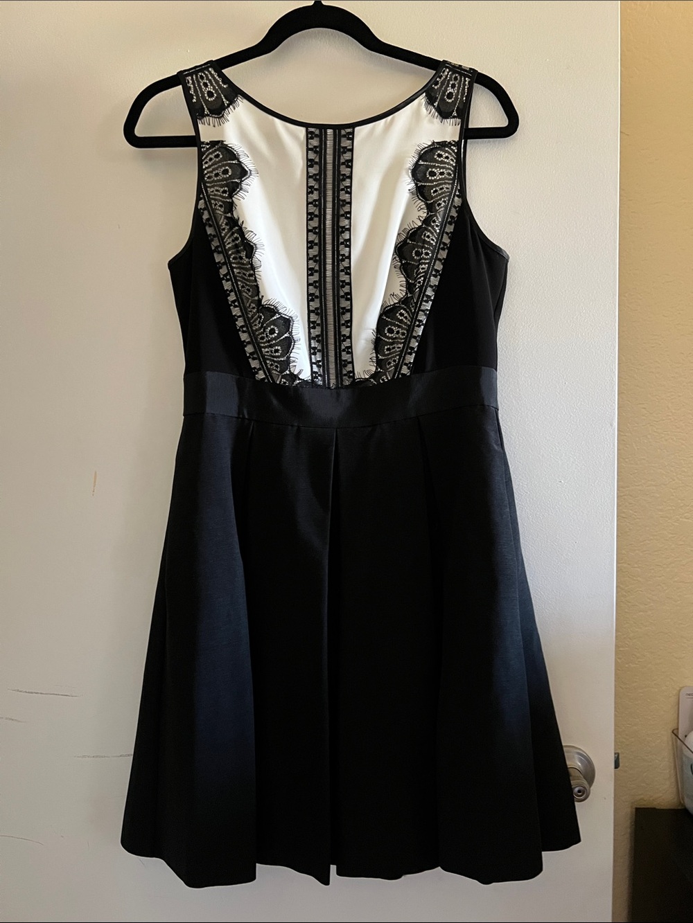 Sleeveless Black Dress with White Lace-Print Panel